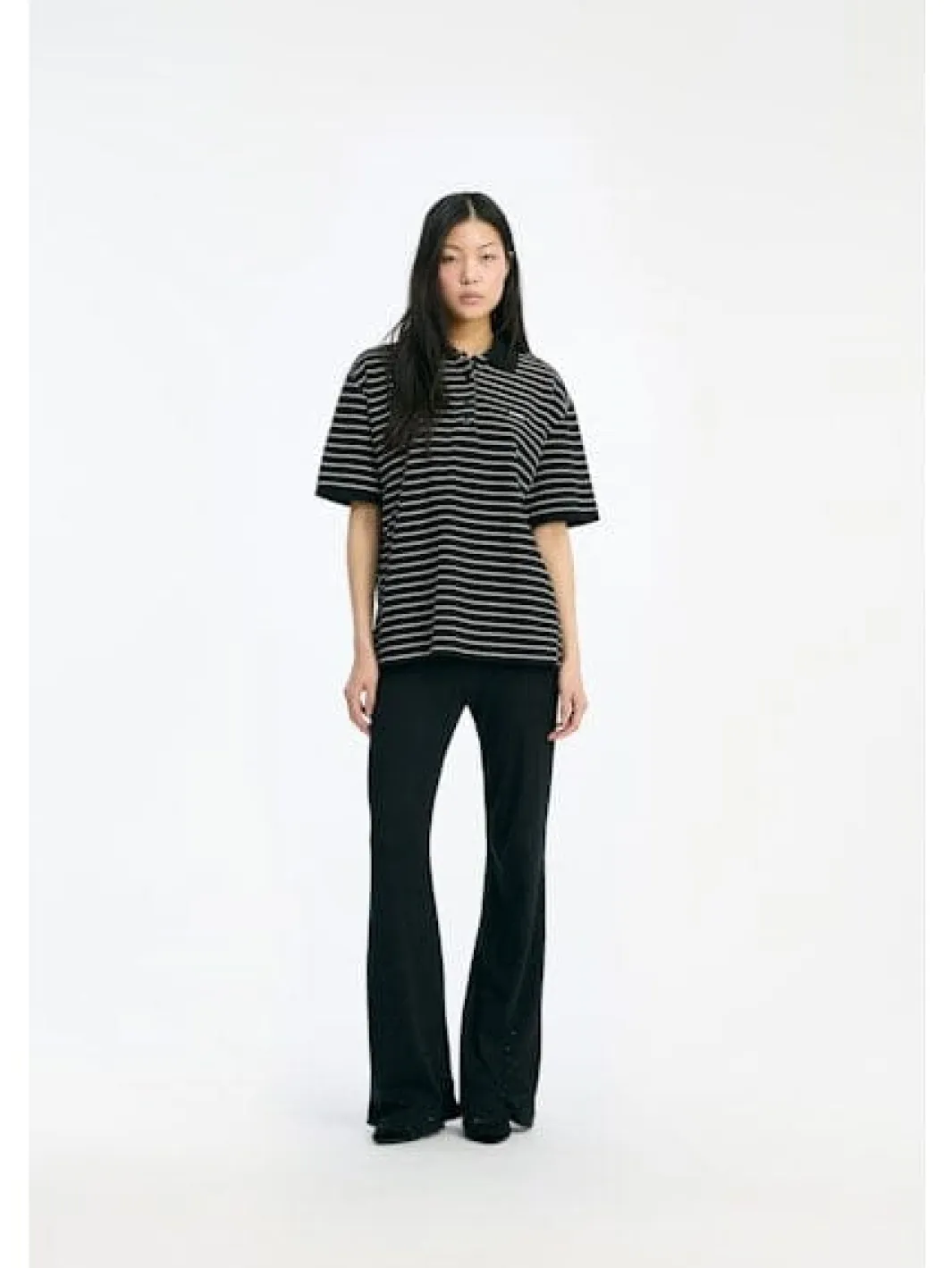 Hot Rotate Pique Shortsleeve Polo 115643000 1000 BLACK COMB.